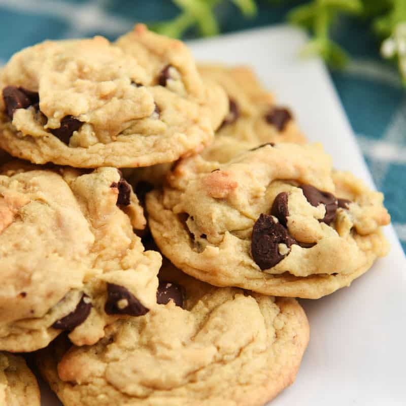 The perfect chocolate chip cookie recipe is sitting right in front of you! These cookies are perfectly chewy and loaded with chocolate goodness. Plus, a secret ingredient for added flavor!