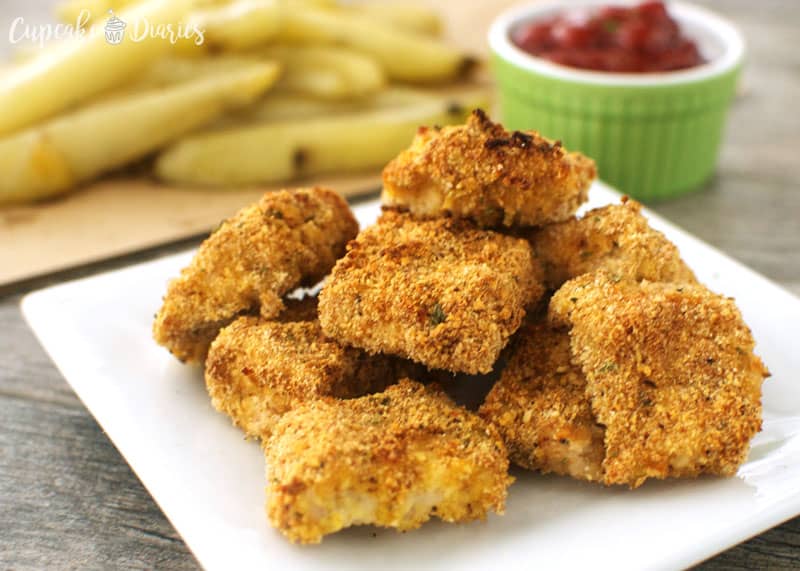Baked Chicken Nuggets and Fries - The homemade version of one of the most popular kids meals! These homemade chicken nuggets and fries are soon to be a family favorite.