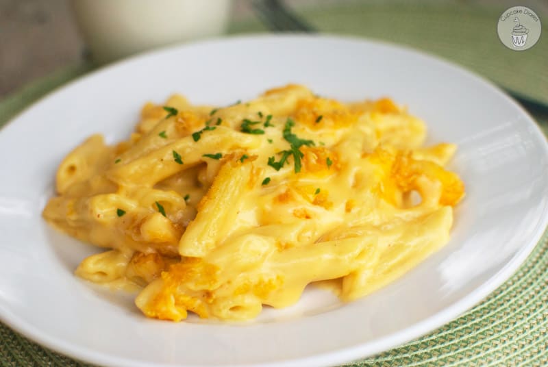 World's Best Mac and Cheese - Penne pasta combined with a delectable creamy cheese sauce and topped with a crunchy topping. This is the BEST mac and cheese!