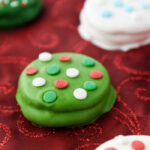 Christmas in Oreo form! These dipped cookies are easy to make and perfect for neighbor treats!