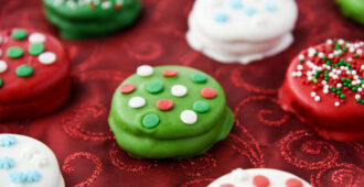 Christmas in Oreo form! These dipped cookies are easy to make and perfect for neighbor treats!