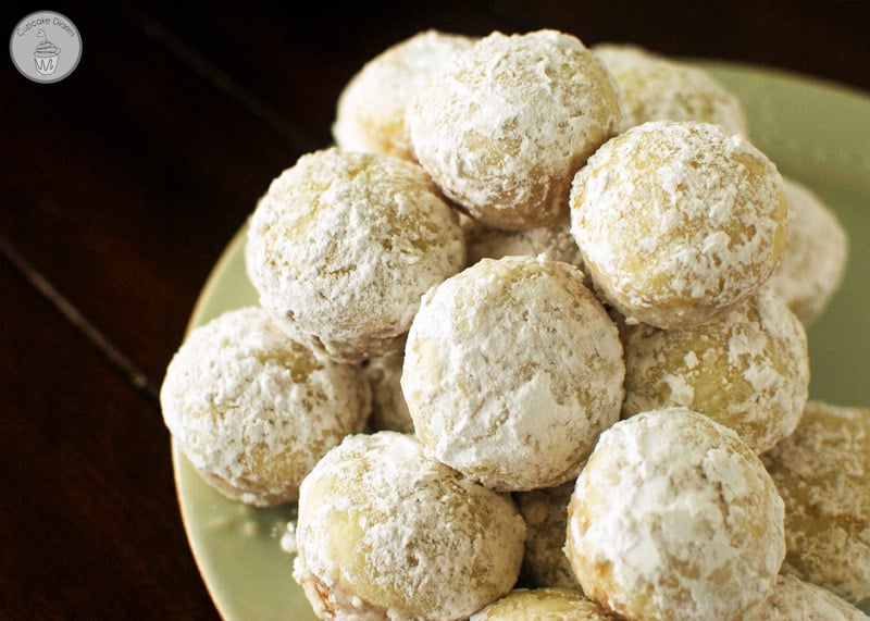 Baked Powdered Sugar Donut Holes - Fluffy donut holes baked to perfection and coated with powdered sugar. This recipe is really easy!