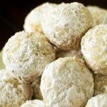 Baked Powdered Sugar Donut Holes - Fluffy donut holes baked to perfection and coated with powdered sugar. This recipe is really easy!