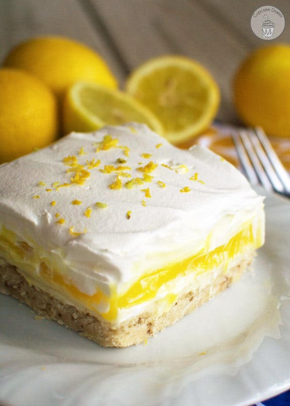 A four-layered lemon dessert that is wonderfully light and a total crowd pleaser!