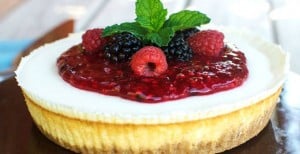 Classic Cream Cheesecake with Mixed Berry Sauce