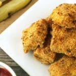 Baked Chicken Nuggets and Fries - The homemade version of one of the most popular kids meals! These homemade chicken nuggets and fries are soon to be a family favorite.