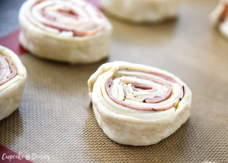 Easy Ham and Cheese Pinwheels - A ham and cheese sandwich rolled up into a fun pinwheel! They're easy to make and fun to eat.