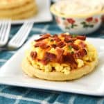 Waffle Breakfast Pizzas are the perfect way to start the day! The whole family will love these crispy Eggo waffles topped with creamy maple butter and breakfast staples.