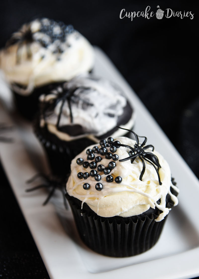 Black and White Spider Web Cupcakes - A creepy and delicious dessert to serve at your Halloween party!