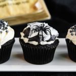 Black and White Spider Web Cupcakes are so fun to make and they're so creepy for a Halloween party! Dark chocolate cake combines with marshmallow buttercream for these spooky treats.