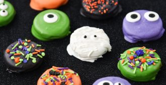 Halloween Dipped Oreos are just about as fun as you can get when it comes to cute and creepy treats! The bright colors are so fun and festive.